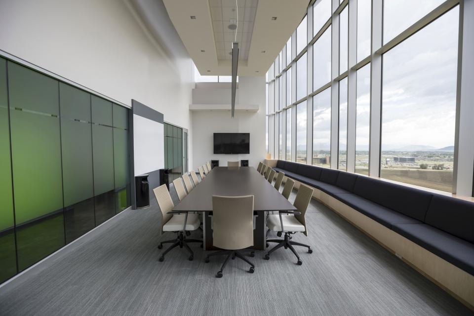 Chairs arranged around a meeting table
